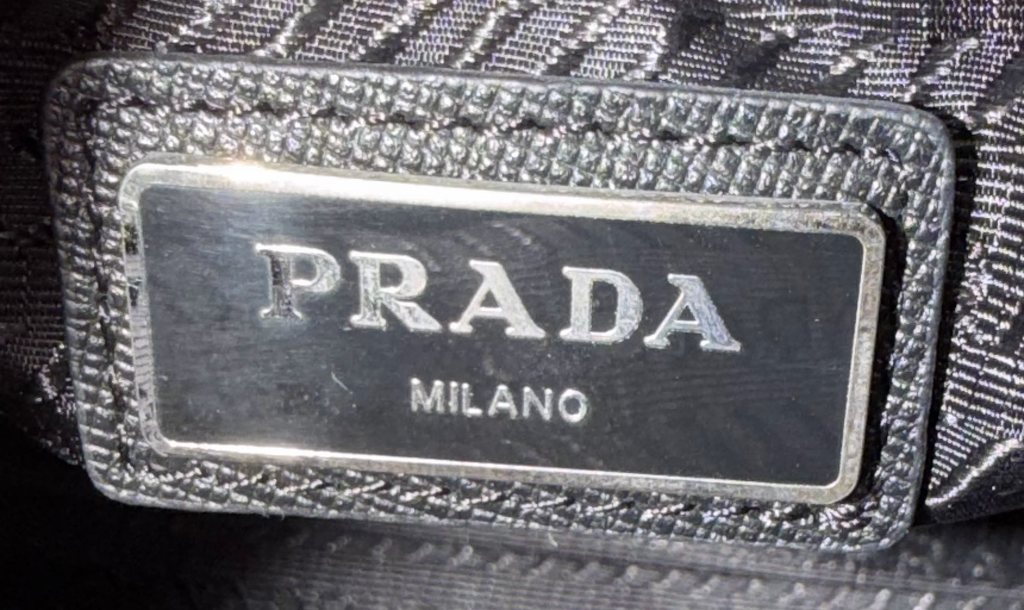 Prada Saffiano Zipper Clutch In Black