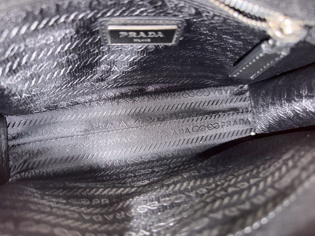 Prada Saffiano Zipper Clutch In Black