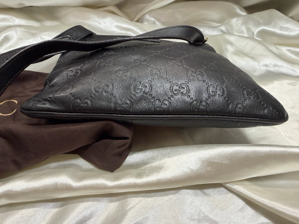 Gucci Monogram Leather Flat Messenger in Black
