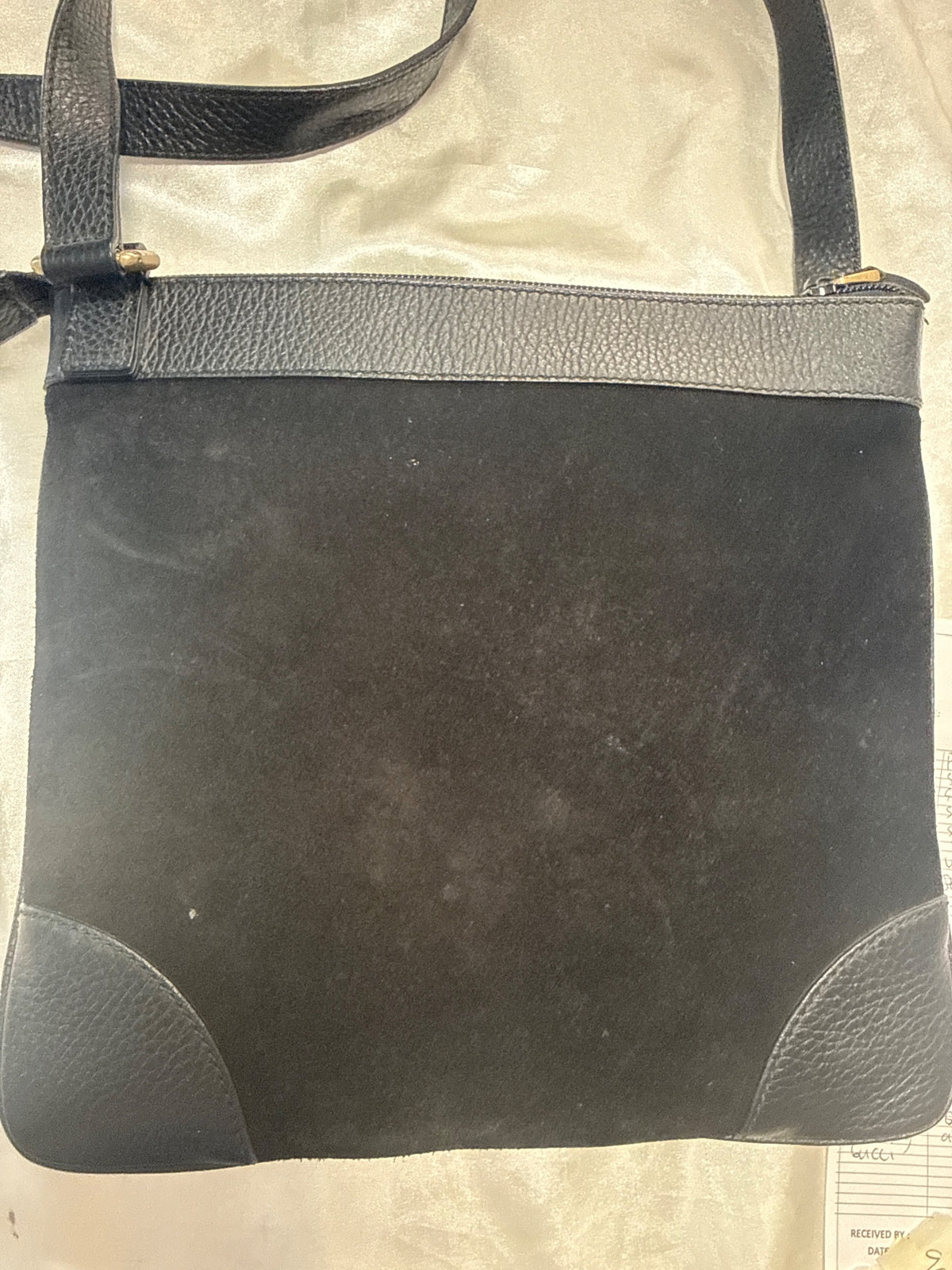 Gucci GG Embossed Crossbody Bag in Black