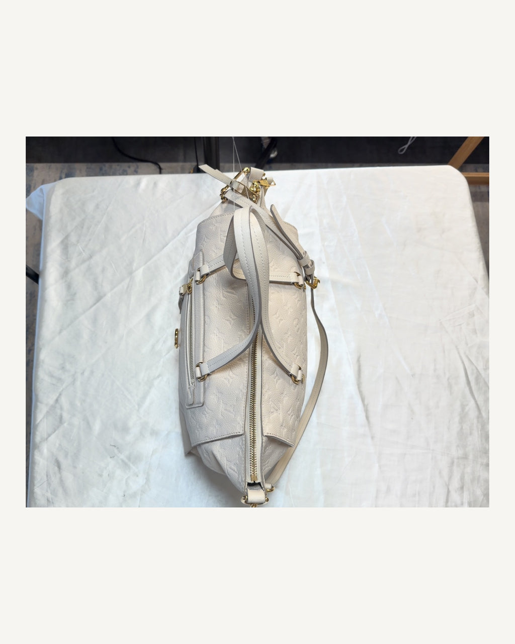 Louis Vuitton Empreinte White Sling Tote in Cream
